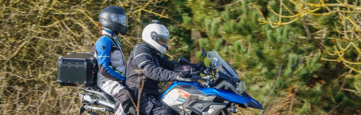 Pillion passenger on motorbike